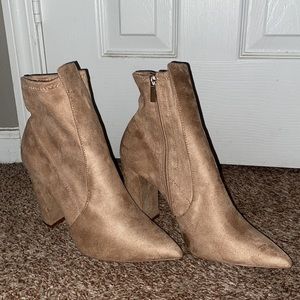 Pointed heel booties with side zipper, never worn.